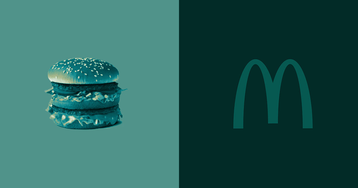 A light green rectangle depicting a photo of a mcdonald's burger sits next to a dark green rectangle depicting the mcdonald's arches