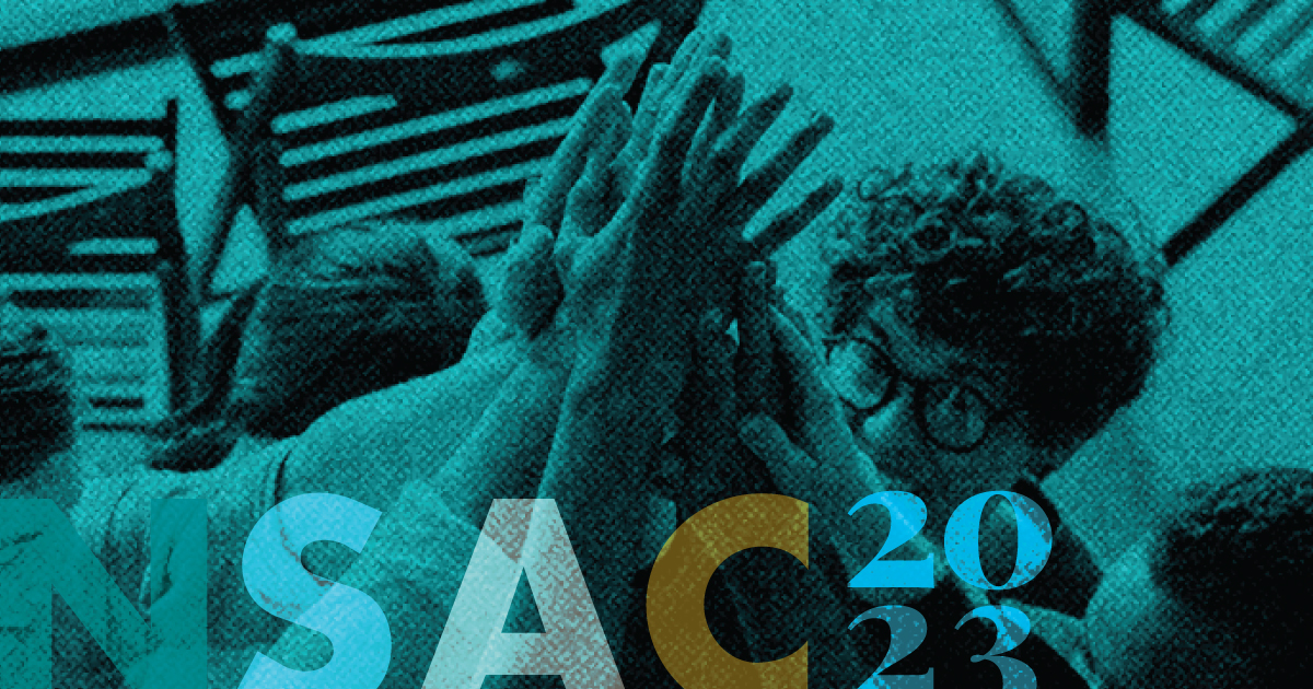 Group of people with their hands together touching about to cheer. A blue filter over the photo and the words NSAC 2023 on top.
